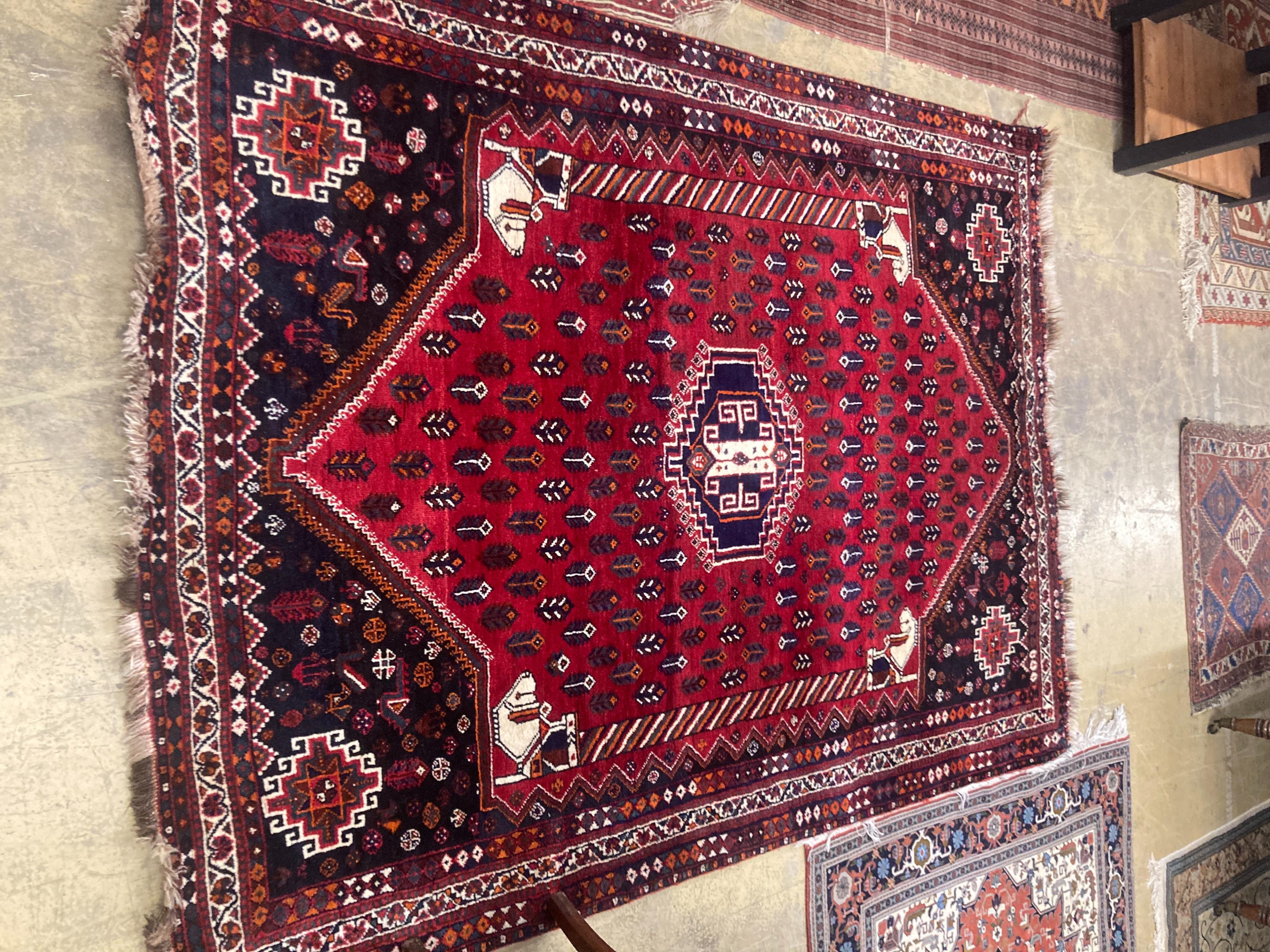 An Iranian carpet, 256 x 184cm